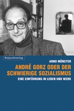 Ein lächelnder älterer Herr mit Brille steht, in die Kamera lächelnd, neben 
einem Regal. Hinter ihm hängt ein kleiner Spiegel. Der Titel ist orange, auf blauem Grund.